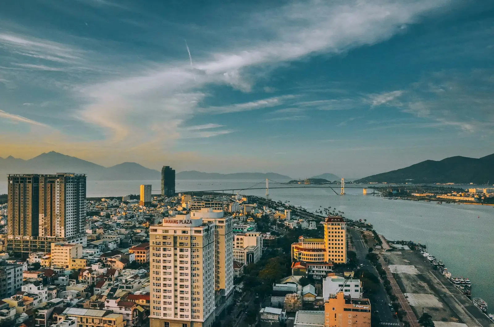 Da Nang and the Han River from above, with mountains behind